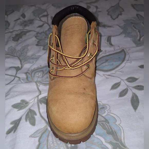 A pair of Timberland Waterproof ladies 9.5W tan leather boots. Pre-loved