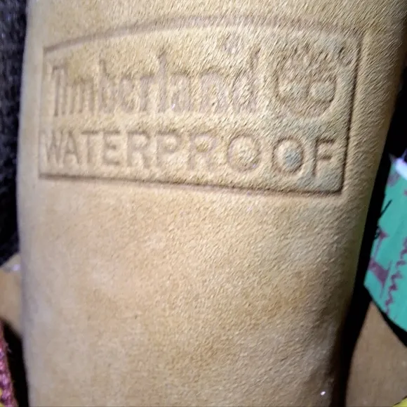A pair of Timberland Waterproof ladies 9.5W tan leather boots. Pre-loved