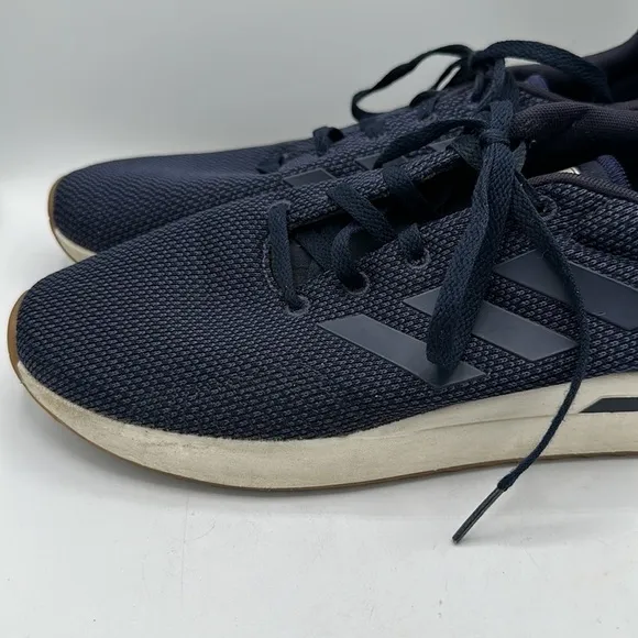 Adidas men’s blue and white running shoes, size 9.5