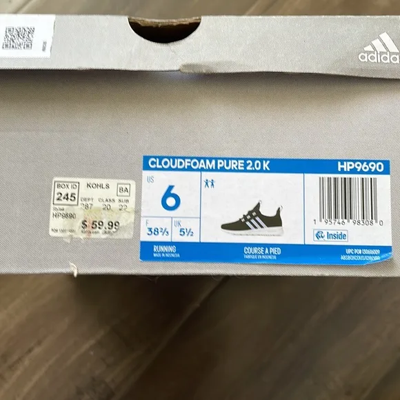 Adidas running girls shoes .