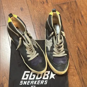 AUTHOR Golden Goose Black and Yellow Sneakers