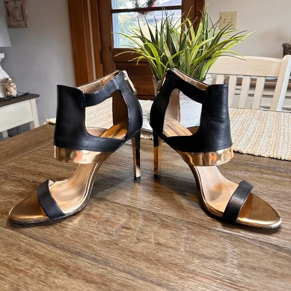 BCBGMAXAZRIA Vero Cuoio Heels Gold Black Leather Strap Stiletto Sandals 7.5