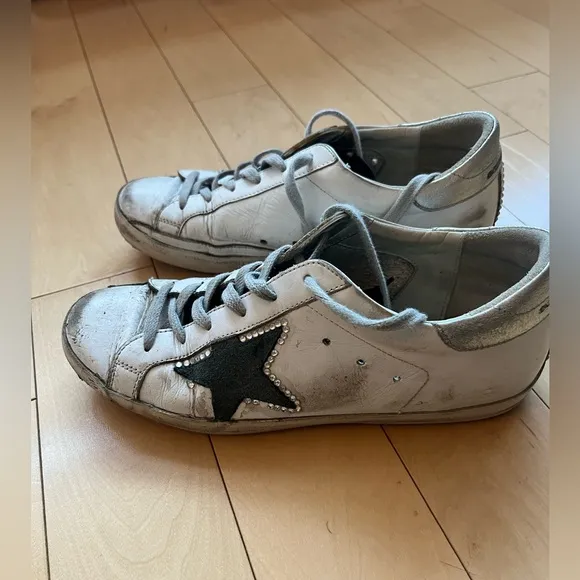 Golden Goose Women’s Size 37 sneaker. Used sneakers but BRAND NEW INSOLES.