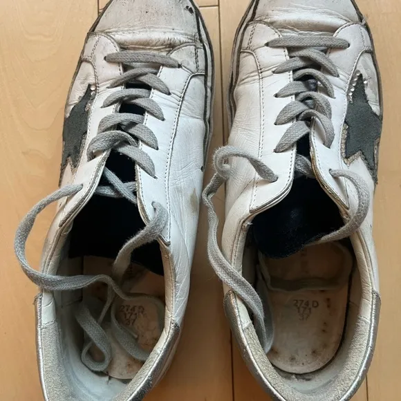 Golden Goose Women’s Size 37 sneaker. Used sneakers but BRAND NEW INSOLES.
