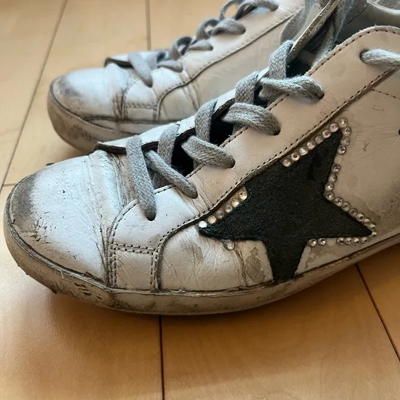 Golden Goose Women’s Size 37 sneaker. Used sneakers but BRAND NEW INSOLES.