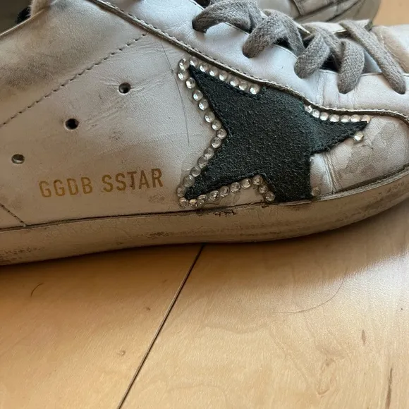 Golden Goose Women’s Size 37 sneaker. Used sneakers but BRAND NEW INSOLES.