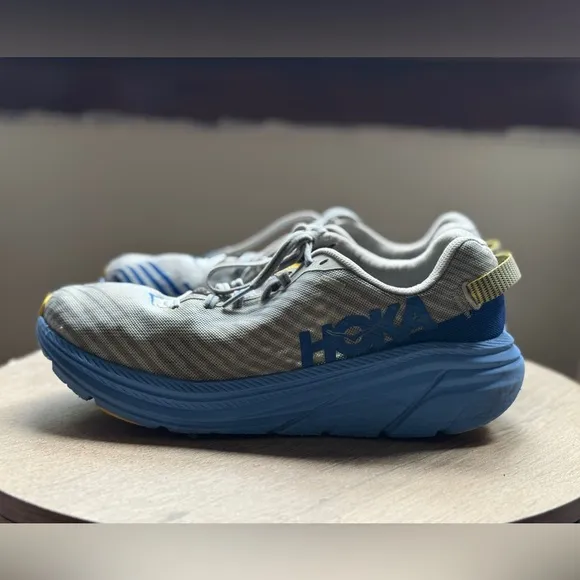 Hoka Gray and Blue Running Shoes with Yellow Accents