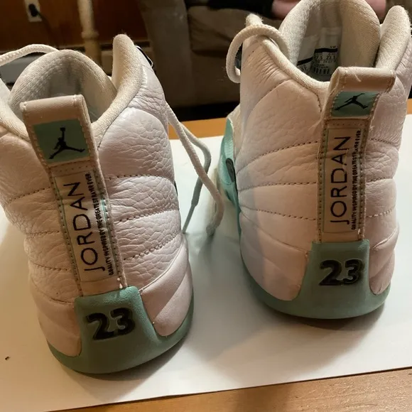 Jordans#23 sneakers woman’s size 5 light aqua/teal color in preowned conditions.