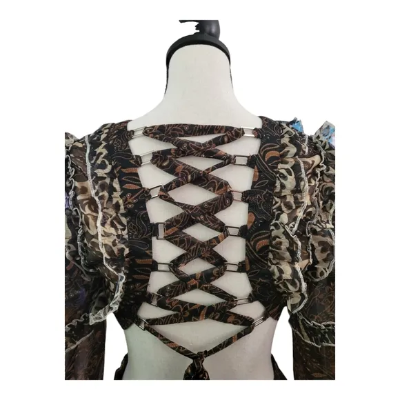 L'Atiste Intricate Pattern Cut Out Lace Up Back Mini Dress by  by Amy