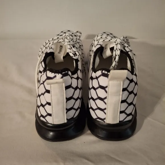 Men's Stylish Black and White Hexagon Pattern Sneakers.