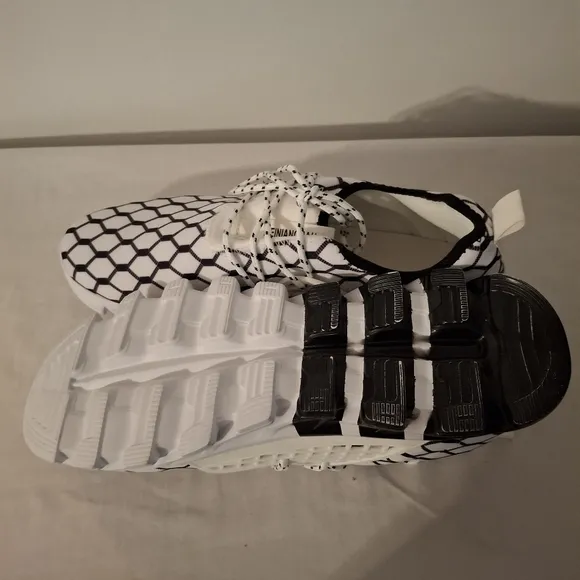Men's Stylish Black and White Hexagon Pattern Sneakers.