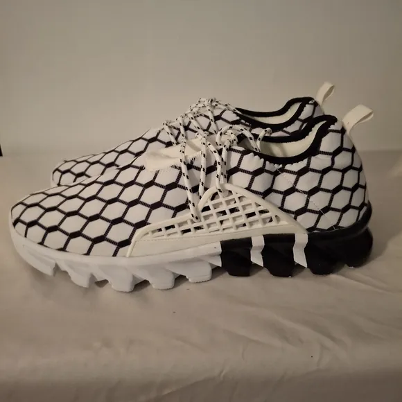 Men's Stylish Black and White Hexagon Pattern Sneakers.