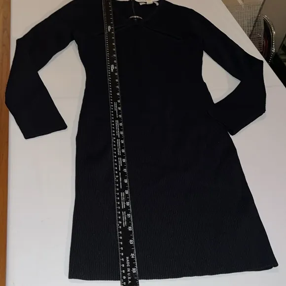 MICHEAL KORS size small black ribbed long sleeve sweater dress with cut outs