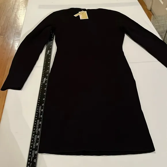 MICHEAL KORS size small black ribbed long sleeve sweater dress with cut outs