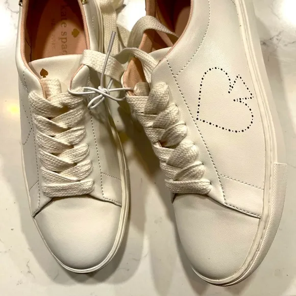 New Kate Spade Sneakers gold back. Perforated spade. 9.5
