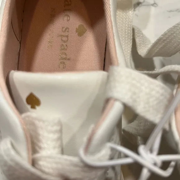 New Kate Spade Sneakers gold back. Perforated spade. 9.5