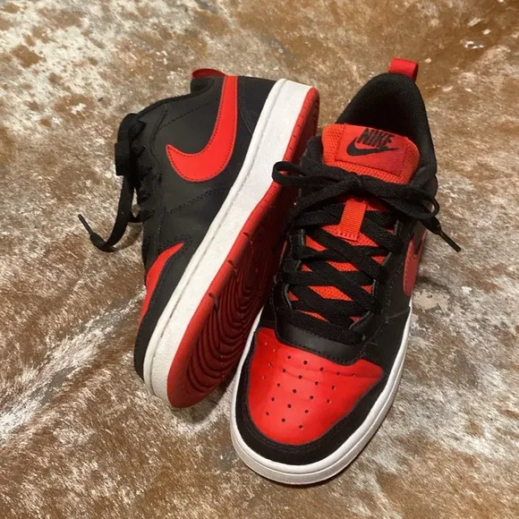 Nike kids black and red sneakers