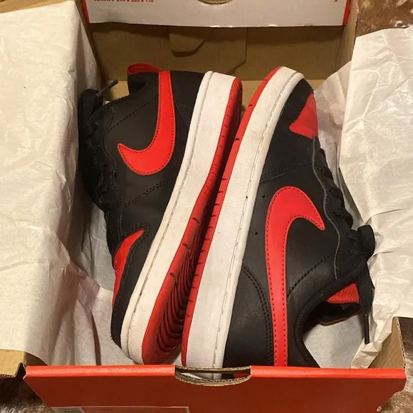 Nike kids black and red sneakers