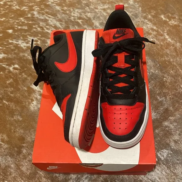 Nike kids black and red sneakers
