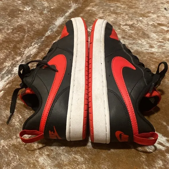 Nike kids black and red sneakers