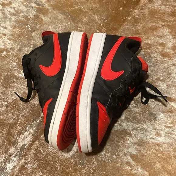 Nike kids black and red sneakers