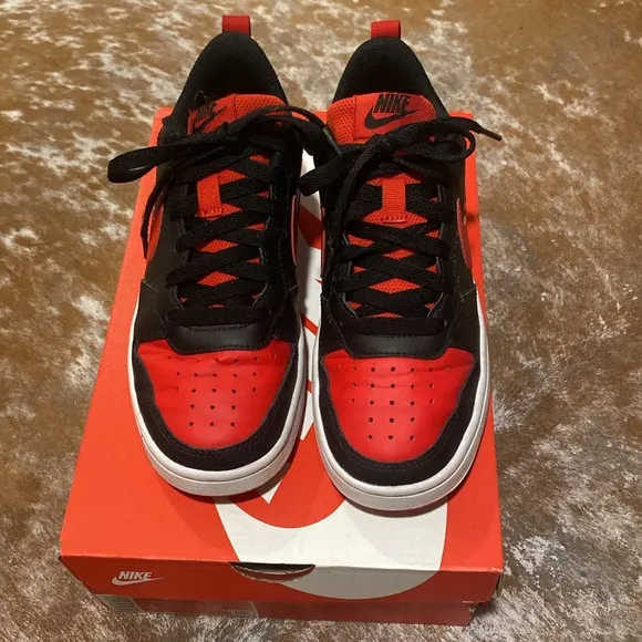 Nike kids black and red sneakers