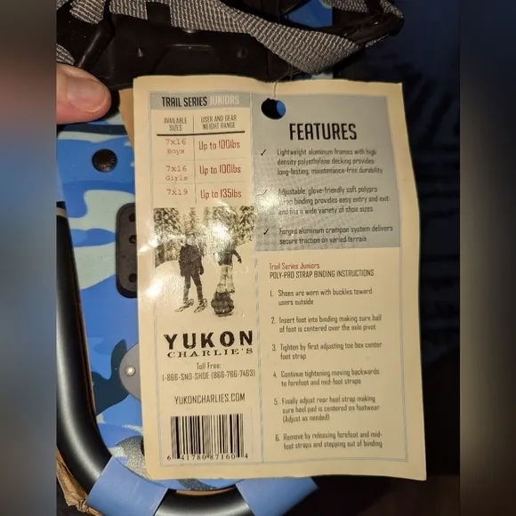 NWT. Youth size snow shoes size 7x16. Yukon Charlie's blue camouflage snowshoe