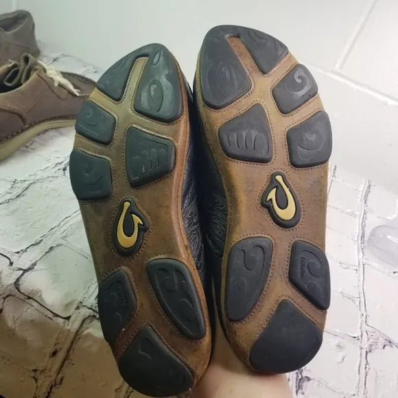 Olukai Kono black leather slip on shoes