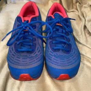 Pink orange and blue Nike sneakers