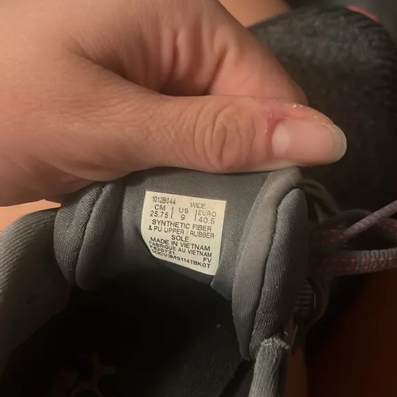 Women’s dark grey and pink ASICS running shoes